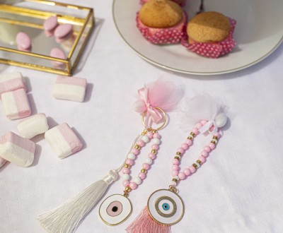 Μπομπονιέρες με μεταλικά στοιχεία μάτια διακοσμημένες με φούντες, κρύσταλλα και διάφορες χάντρες