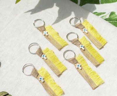 Μαρτυρικά σε μπρελόκ με κίτρινη τρέσα και σταυρουδάκι με μάτι