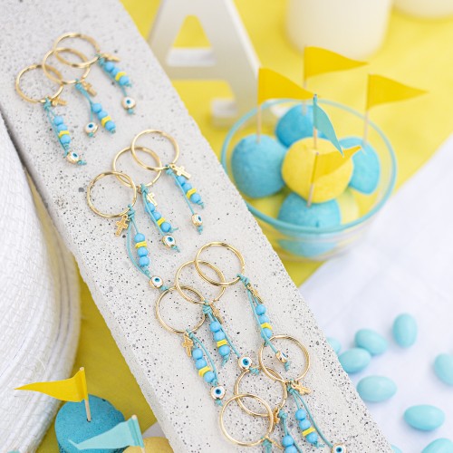 Μαρτυρικά σε μπρελόκ με μεταλλικά στοιχεία σταυρό και μάτι, ακρυλικές χάντρες και δερμάτινο κορδόνι