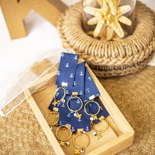 Μαρτυρικά σε μπρελόκ με ύφασμα με pattern άγκυρες, μεταλλικο στοιχείο σταυρό και γυάλινο στοιχείο μάτι