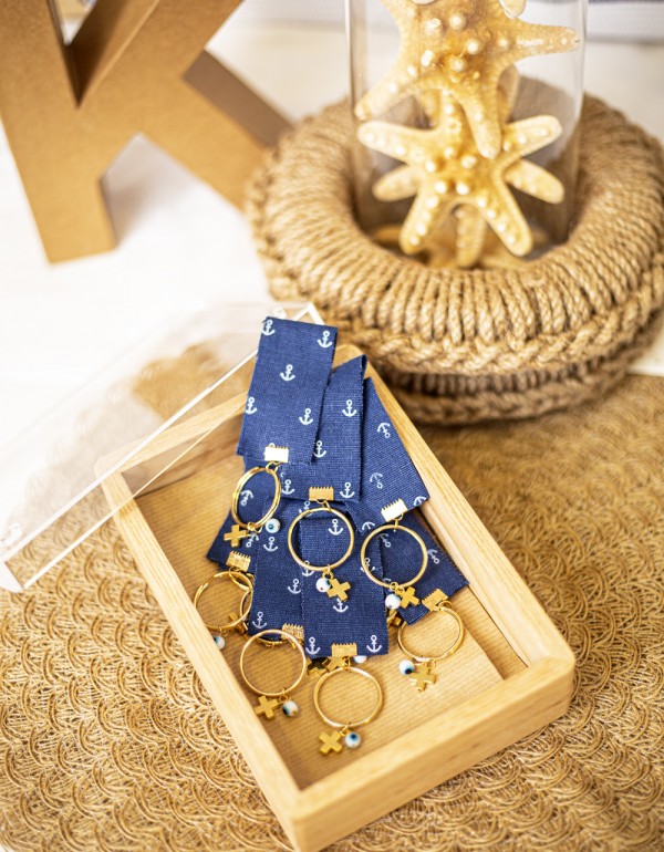 Μαρτυρικά σε μπρελόκ με ύφασμα με pattern άγκυρες, μεταλλικο στοιχείο σταυρό και γυάλινο στοιχείο μάτι