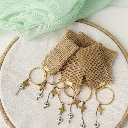 Μαρτυρικά σε μπρελόκ με ύφασμα τσουβαλέ μεταλλικά στοιχεία σταυρό και μάτι και νάυλον κορδόνι