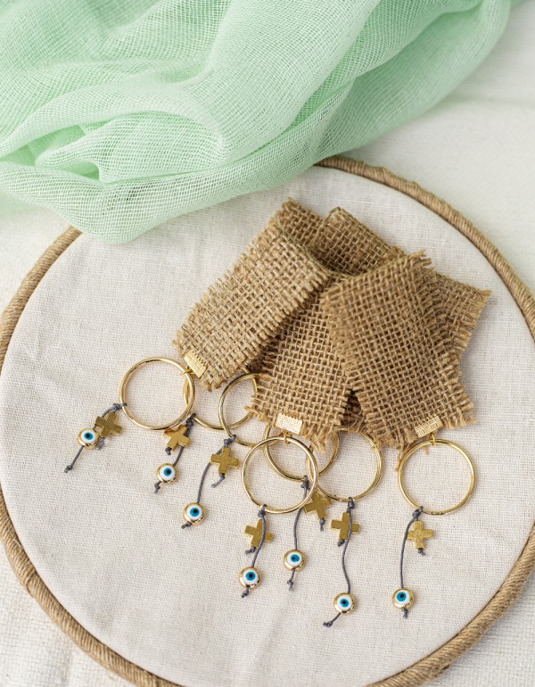 Μαρτυρικά σε μπρελόκ με ύφασμα τσουβαλέ μεταλλικά στοιχεία σταυρό και μάτι και νάυλον κορδόνι