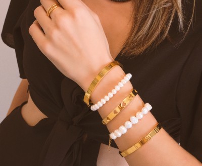 Σετ ατσάλινα βραχιόλια χειροπέδες και μαργαριτάρια