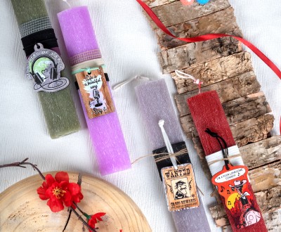 Πασχαλινές λαμπάδες σαγρέ οβάλ σε διαφορά χρώματα , με ξύλινο στοιχείο ''All you need is love and music'', ''Life is a beautiful song...Sing it'', ''I 'm a poor lonesome cowboy'', ''WANTED''